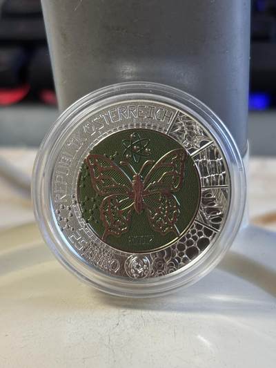 第192期拍卖 - 奥地利2017年银铌镶嵌系列微观世界银铌双金属币，金属:900银998铌，重量:16.5克（10克银，6.5克铌）直径:34毫米，发行：65000枚