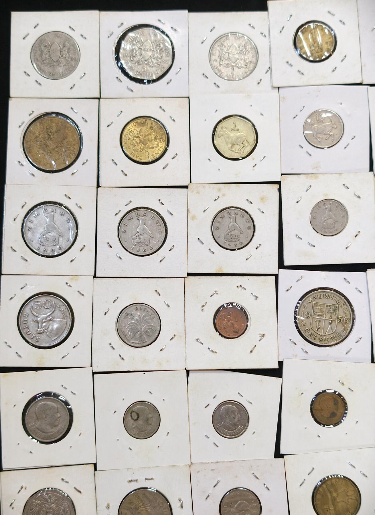 甄臻铺-世界币章拍卖（第53期），甄品场拍品征集中，送拍享返佣金等优惠多多 非洲8个国家45枚硬币，冈比亚5枚，津巴布韦7枚，博茨瓦纳3枚，肯尼亚9枚，南非7枚，坦桑尼亚8枚，马拉维6枚，毛里求斯2枚