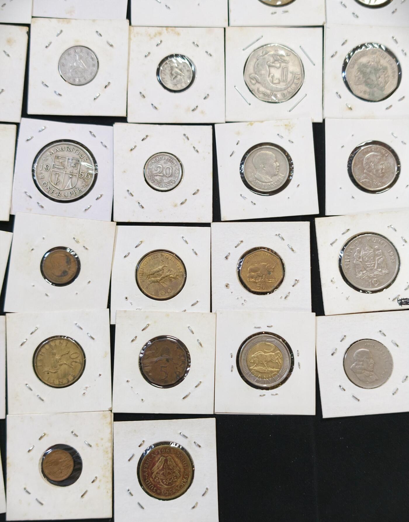 甄臻铺-世界币章拍卖（第53期），甄品场拍品征集中，送拍享返佣金等优惠多多 非洲8个国家45枚硬币，冈比亚5枚，津巴布韦7枚，博茨瓦纳3枚，肯尼亚9枚，南非7枚，坦桑尼亚8枚，马拉维6枚，毛里求斯2枚