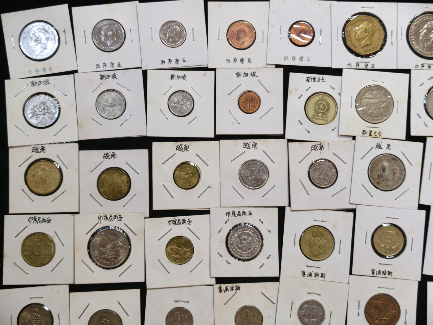 甄臻铺-世界币章拍卖（第53期），甄品场拍品征集中，送拍享返佣金等优惠多多 亚洲、大洋洲7个国家49枚硬币，印尼6枚，越南6枚，斯里兰卡4枚，新加坡5枚，菲律宾11枚，塞浦路斯10枚