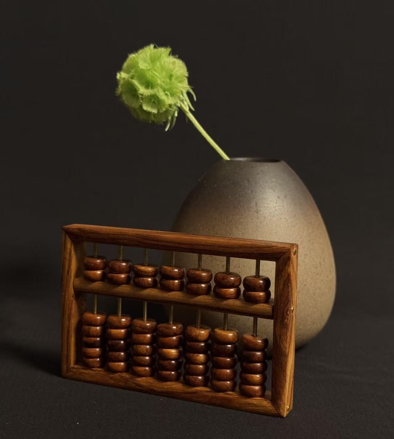 零元拍：“算盘一响，黄金万两”海南黄花梨七档小算盘。尺寸：92/60.5MM