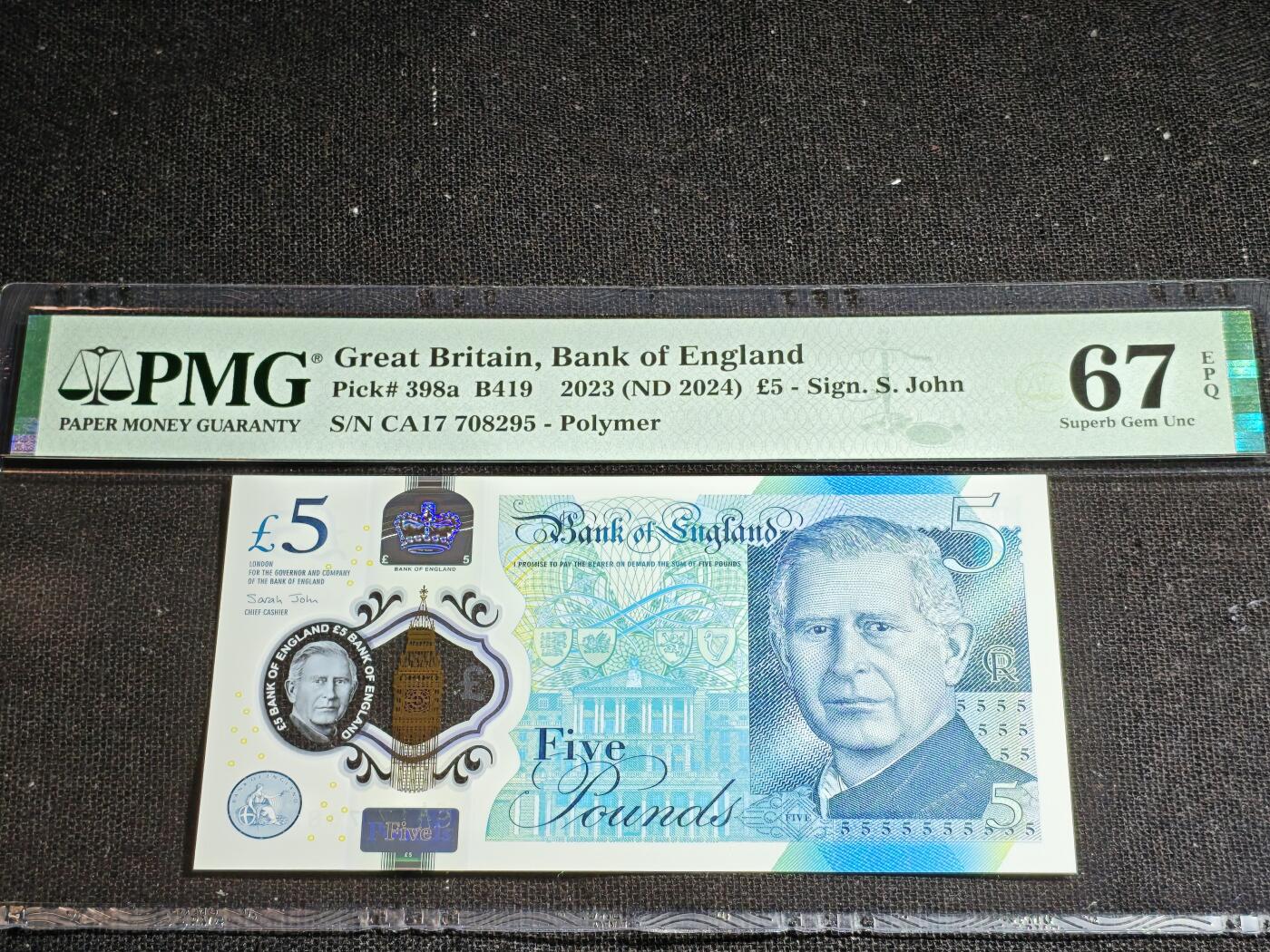 刘世昌艺术品销售中心～虎踞龙蟠*金杨在线联拍群第518期  英国2023年5镑（PMG 67E 号码：CA17 708295）1枚。