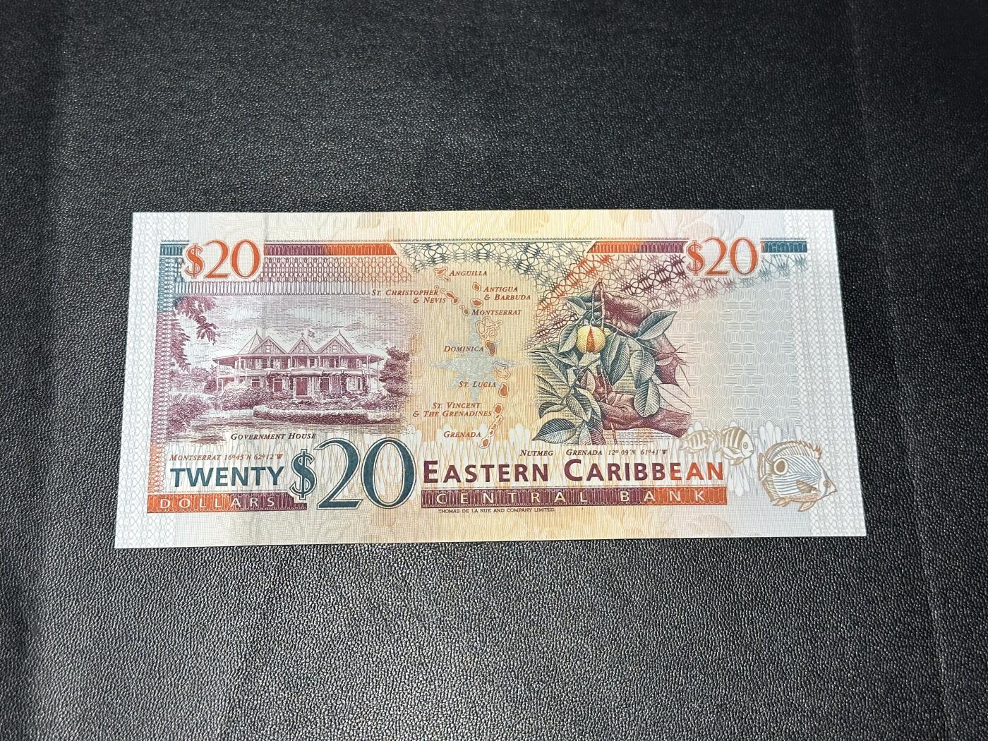 《外钞收藏家》第六百一十五期（畅拍场）（长期征集拍品、欢迎藏友们联系合作） 1994年东加勒比20元 全新UNC