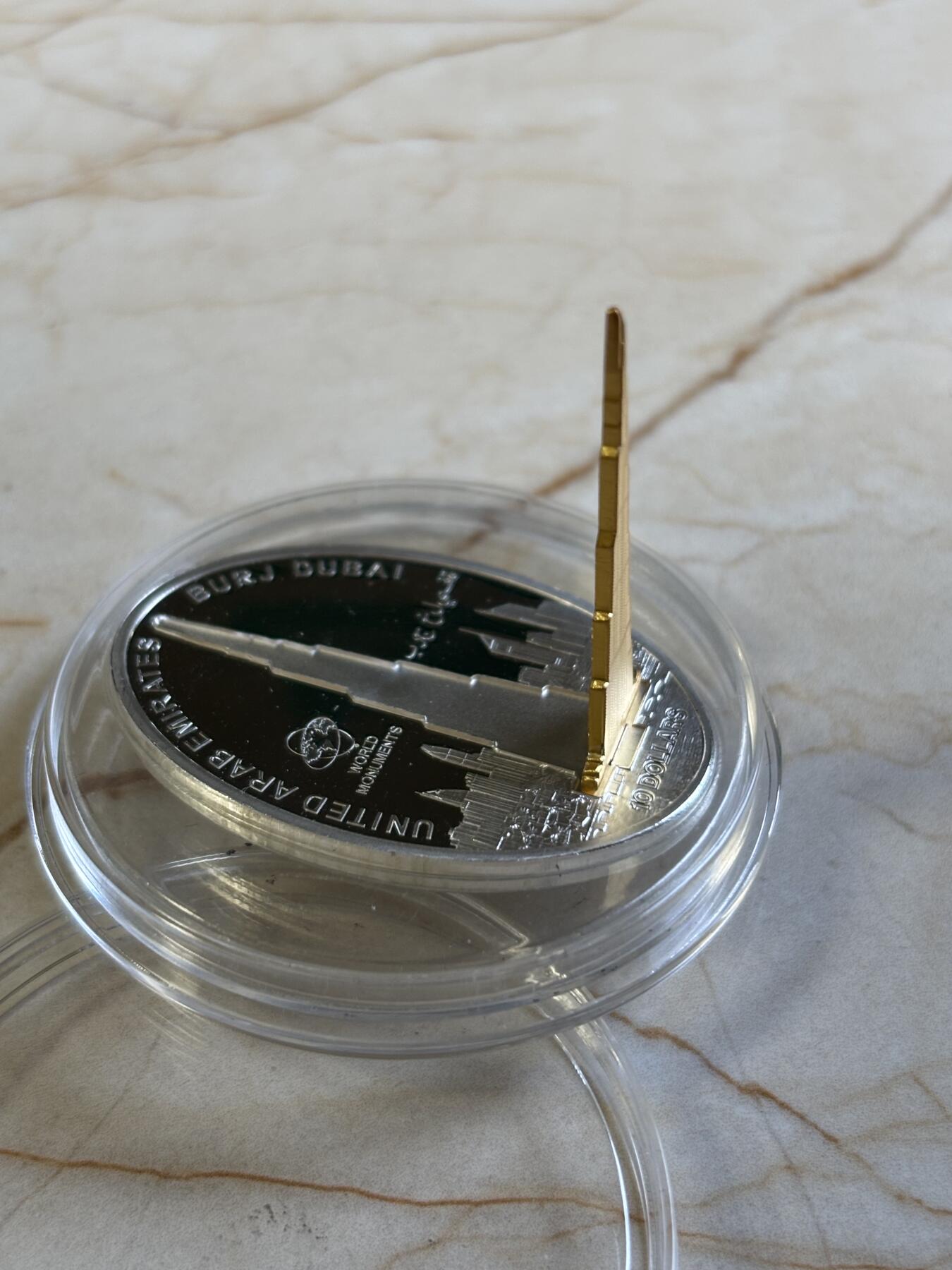 第192期拍卖 库克2010年世界奇观系列迪拜塔镀金立体1盎司纪念银币，999银镀金，发行3000枚