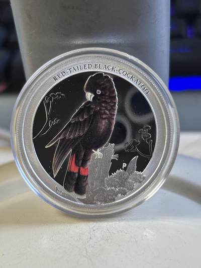第192期拍卖 - 澳大利亚2013年雀鸟系列红尾黑凤头鹦鹉银币，999银，发行10000枚