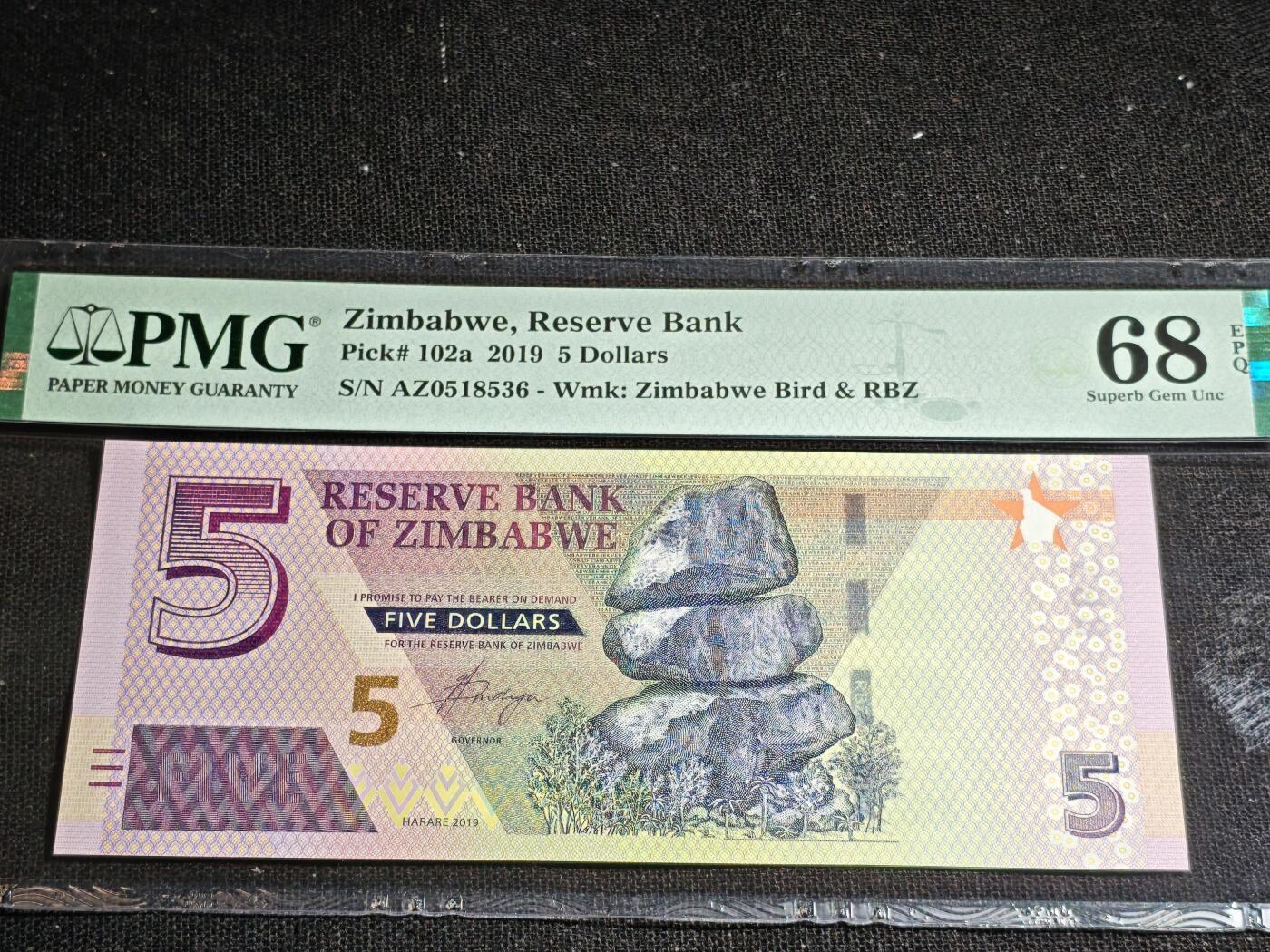 刘世昌艺术品销售中心～虎踞龙蟠*金杨在线联拍群第518期 津巴布韦2019年5元（PMG  68E   号码：AZ0518536）1枚。