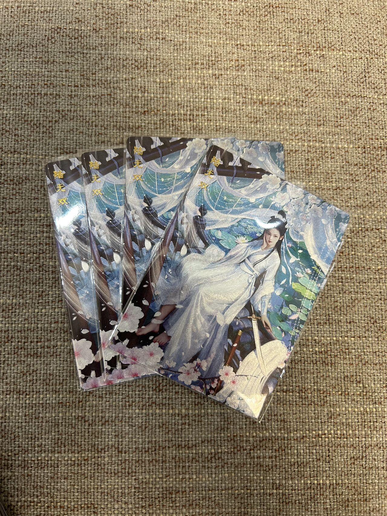 喜灰玩卡拍卖第五期，接拍品0佣金，欢迎送拍，释放现金流，让自己有资金可以购买更多喜欢的卡牌，让别的卡友能淘到更多心仪的卡牌 桔梗 神凰百剑行  陆无双 三渐变加艺术卡