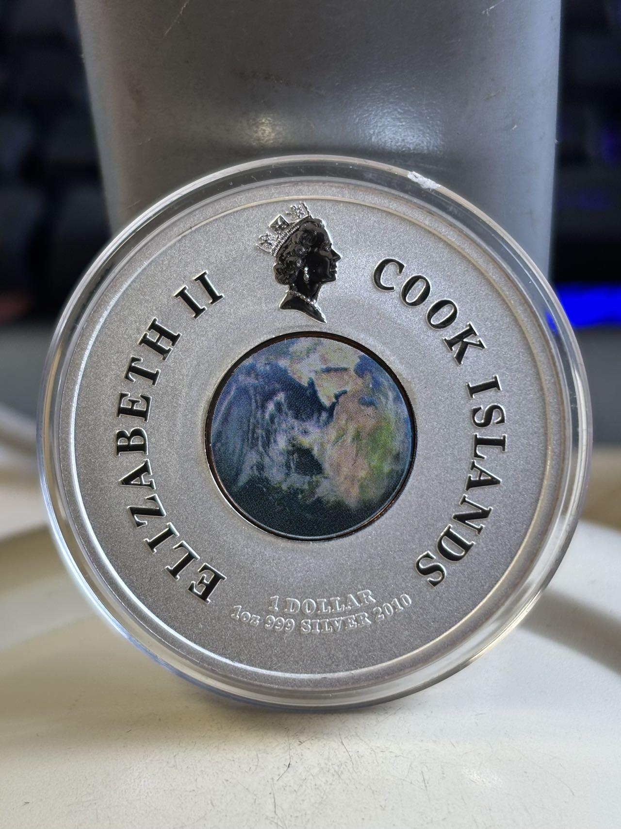 第192期拍卖 库克2010年第一架航天飞机彩色纪念银币，999银，1盎司