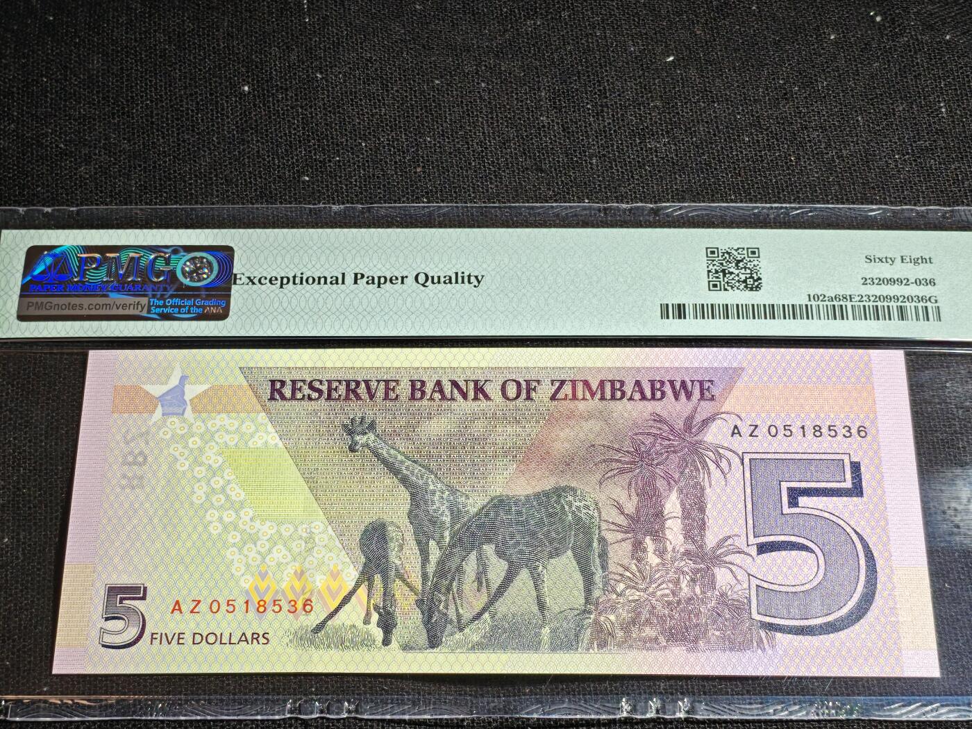 刘世昌艺术品销售中心～虎踞龙蟠*金杨在线联拍群第518期 津巴布韦2019年5元（PMG  68E   号码：AZ0518536）1枚。