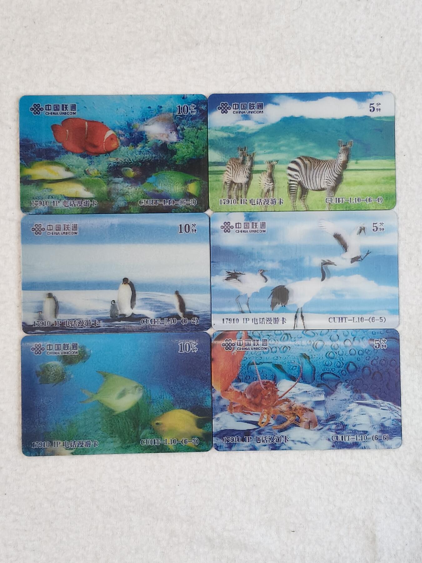 易卡拍卖第80期 珍稀动物和鱼类。联通立体电话卡（比较少见）。密码已刮开，品相如图所示！
