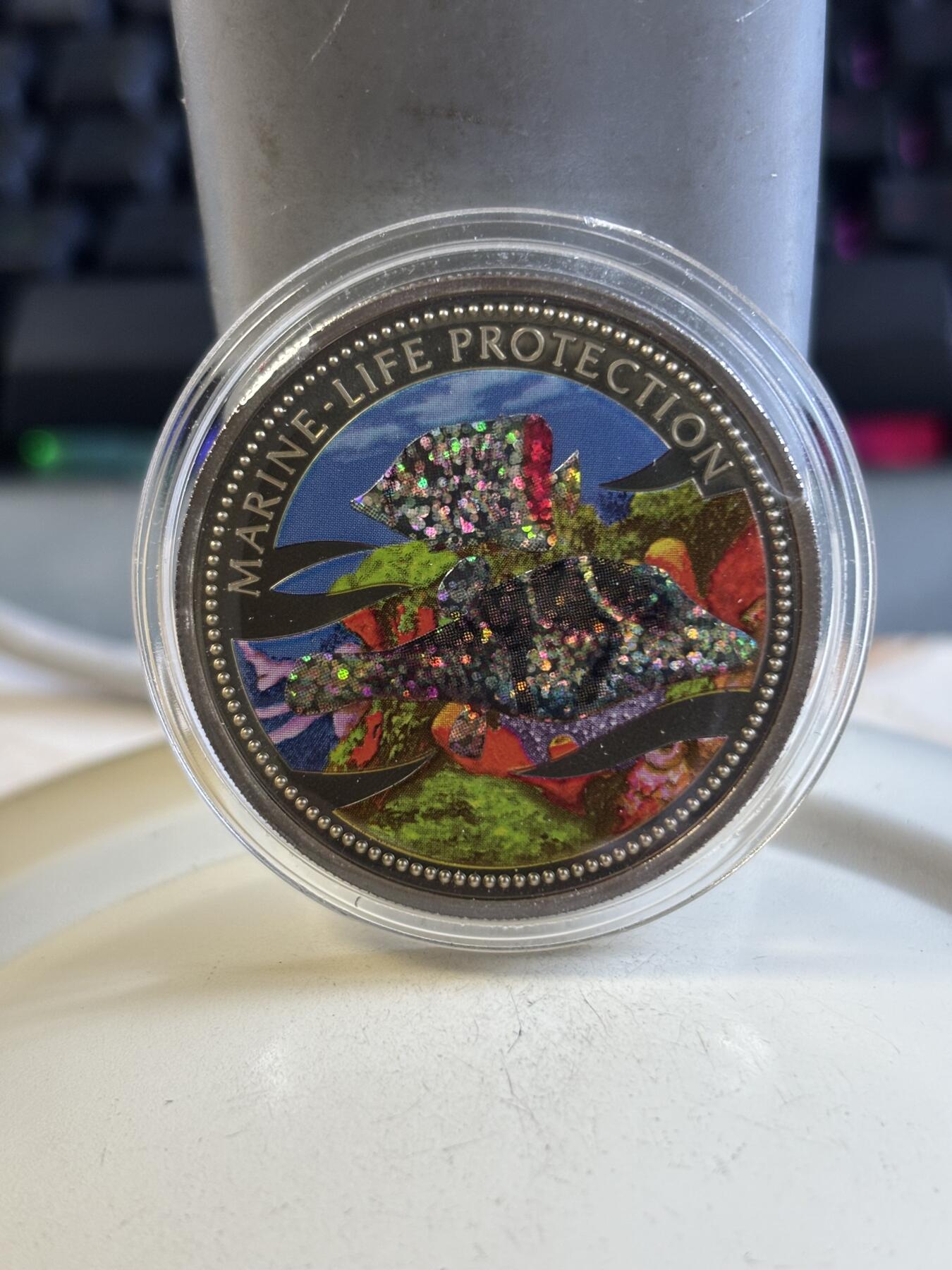 第192期拍卖 帕劳2002年海洋保护系列闪光鱼海神波塞冬幻彩铜镍纪念币