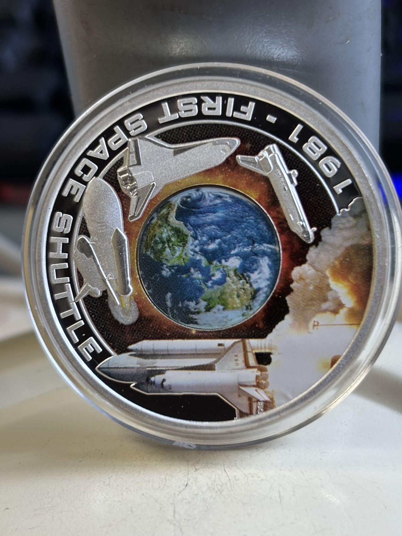 第192期拍卖 库克2010年第一架航天飞机彩色纪念银币，999银，1盎司