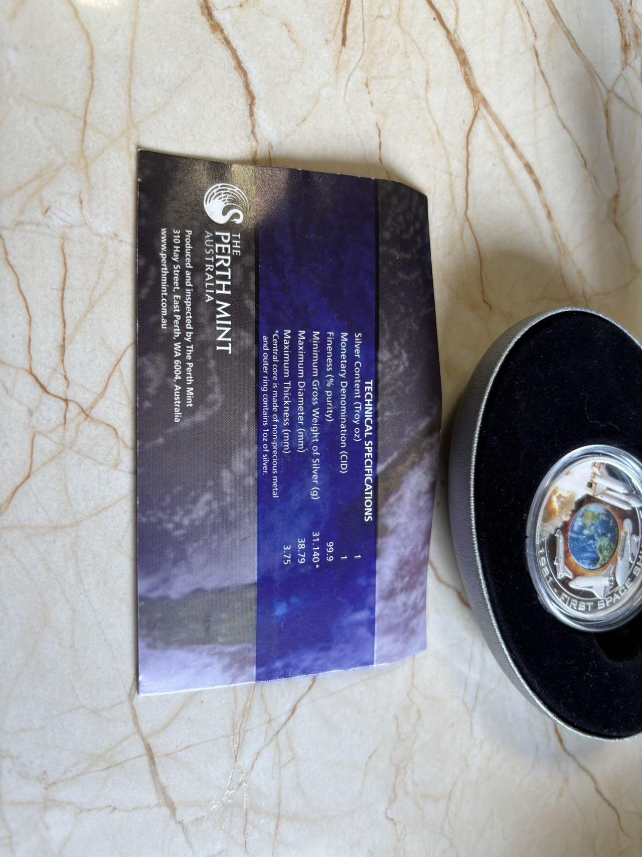 第192期拍卖 库克2010年第一架航天飞机彩色纪念银币，999银，1盎司