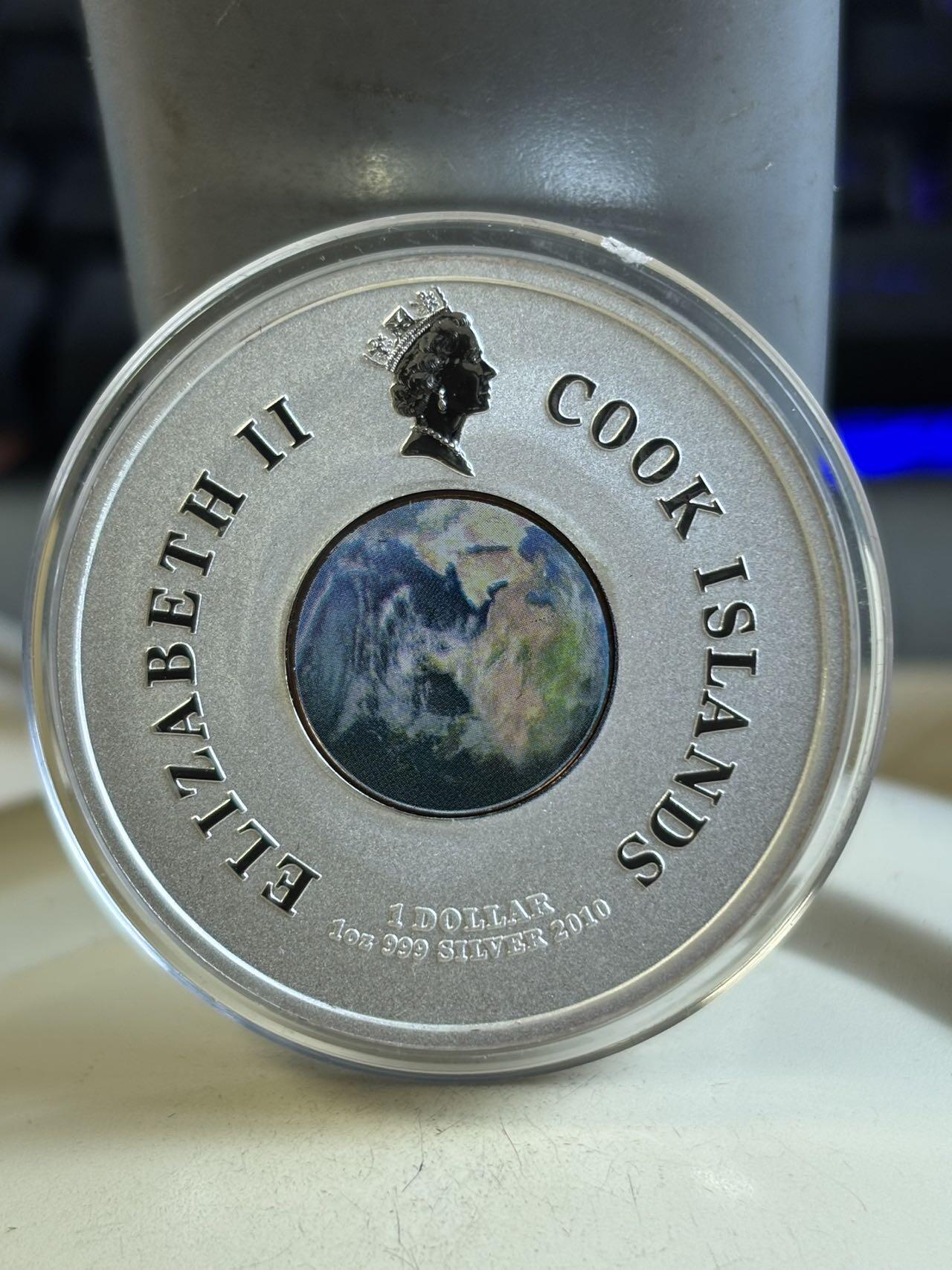 第192期拍卖 库克2010年第一架航天飞机彩色纪念银币，999银，1盎司