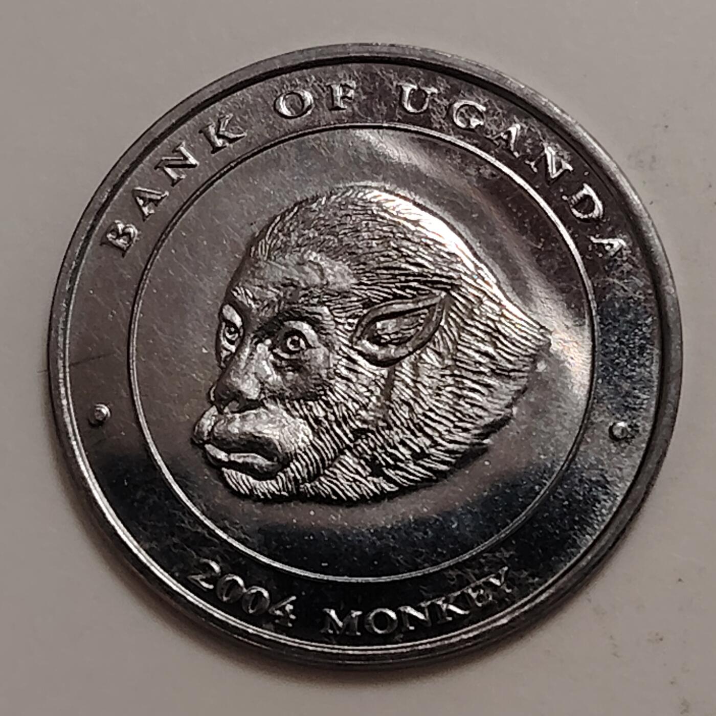 布加迪🐬～世界钱币(上海)🌾第 279 期 /  各国套币和散币 乌干达🇺🇬 2004年 100先令生肖币～猴