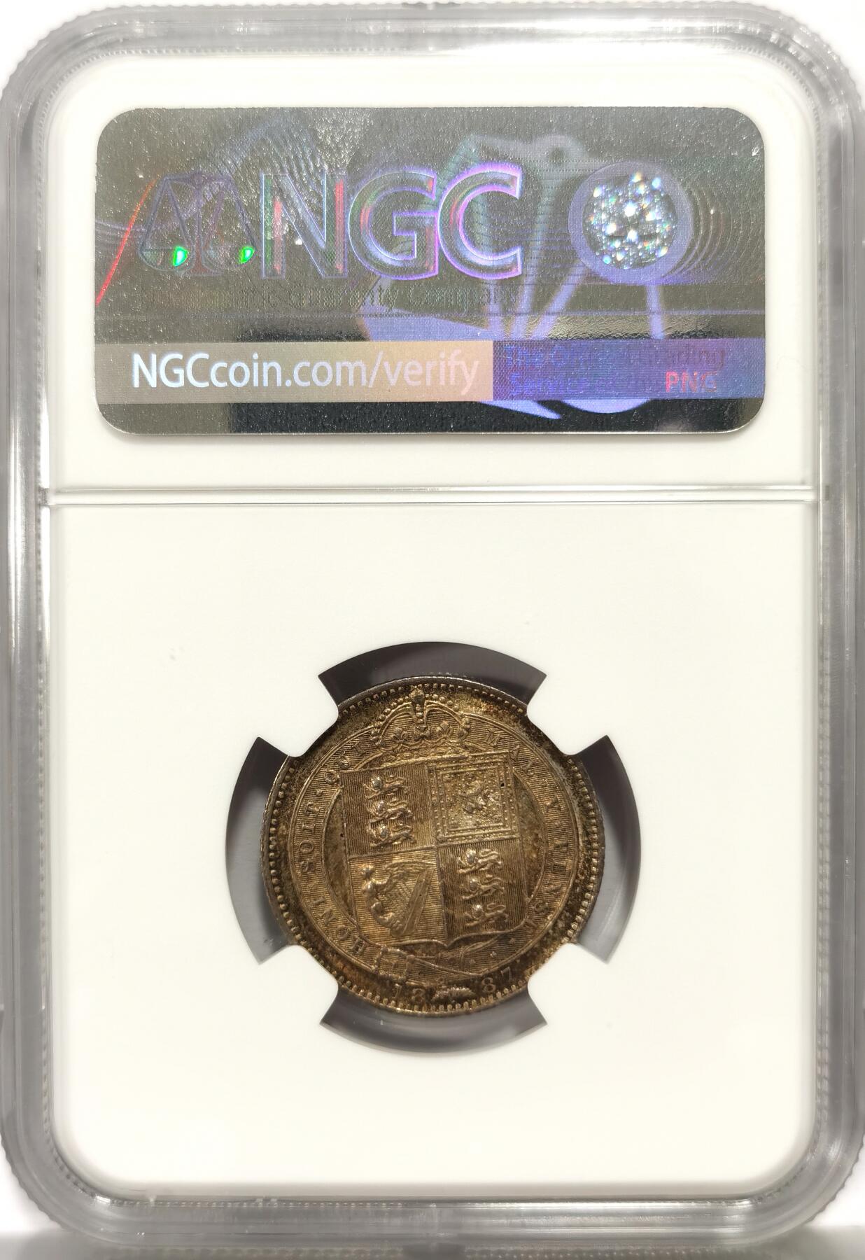 博洋堂世界钱币拍卖第163期（全场包邮） NGC MS62 英国1887年维多利亚女王高冠1先令银币，原汁原味老包浆，包浆醇厚浓郁，味道绝，人物，头像，图案栩栩如生，小巧精致，极美五彩包浆。