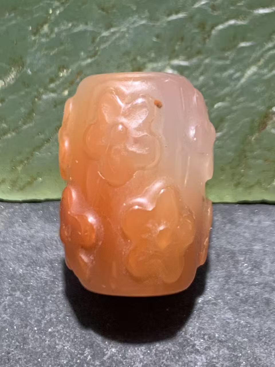 精美川料荔枝冻飘红南红玛瑙雕刻满花桶珠一个