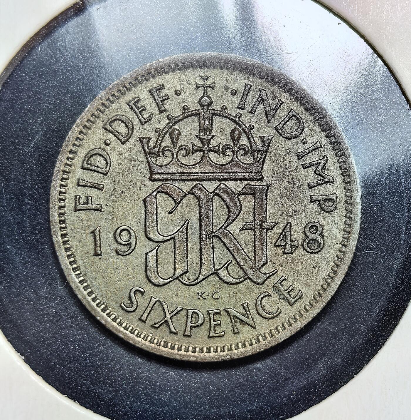 外国优质老铜币银币苏联纪念章，每周六晚九点倒数截拍，满百包邮可寄存，持续收拍 英国乔治六世1948年6便士，二战后材质由含银改为铜镍合金，币面仍保留 “印度皇帝” 缩写，见证英帝国殖民体系松动与战后货币改革。