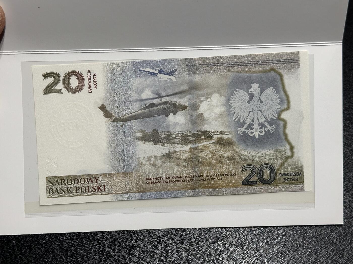 《外钞收藏家》第六百一十五期（畅拍场）（长期征集拍品、欢迎藏友们联系合作） 2022年波兰纪念钞 带册子 豹子号999  倒置号 全新UNC