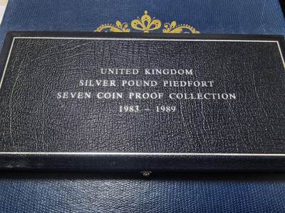 长老汇马年精选第七场拍卖 - 1983-1989英国1英镑精制加厚银币套装，133克925银，盒证全，500套