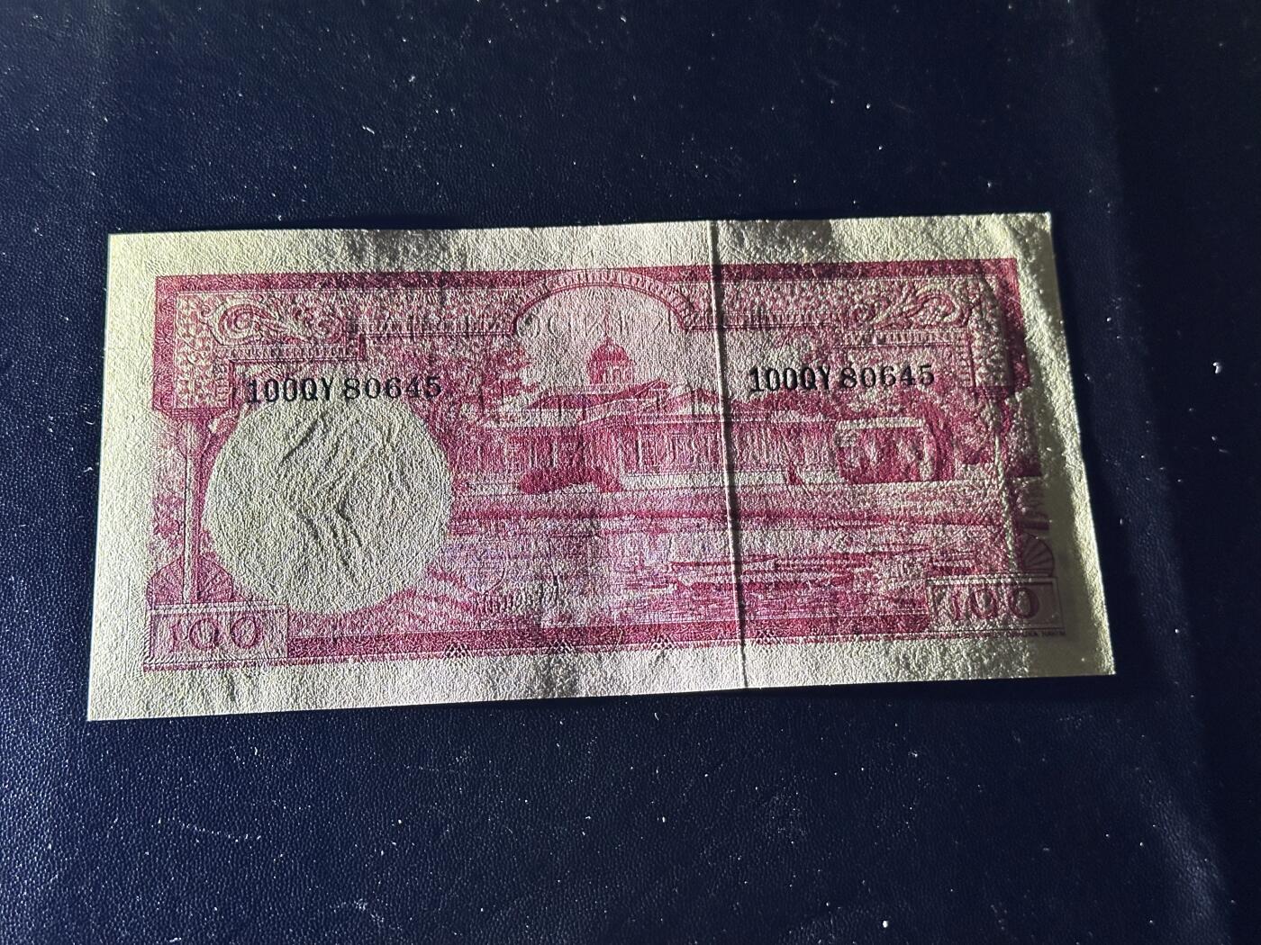 《外钞收藏家》第六百一十五期（畅拍场）（长期征集拍品、欢迎藏友们联系合作） 1957年印度尼西亚100卢比 全新边角不绝