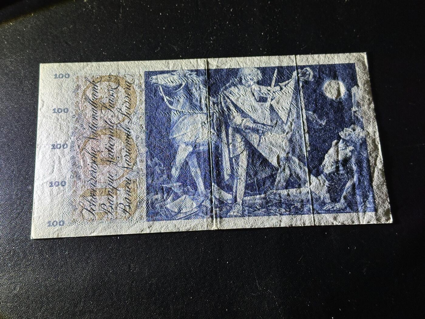 《外钞收藏家》第六百一十五期（畅拍场）（长期征集拍品、欢迎藏友们联系合作） 瑞士100法郎 割袍 非全新 品相如图