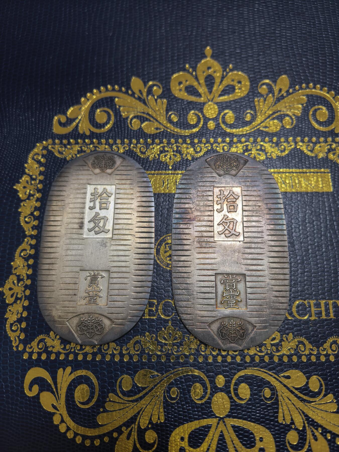 长老汇马年精选第七场拍卖 日本纯银小判2枚，75.73克，原盒