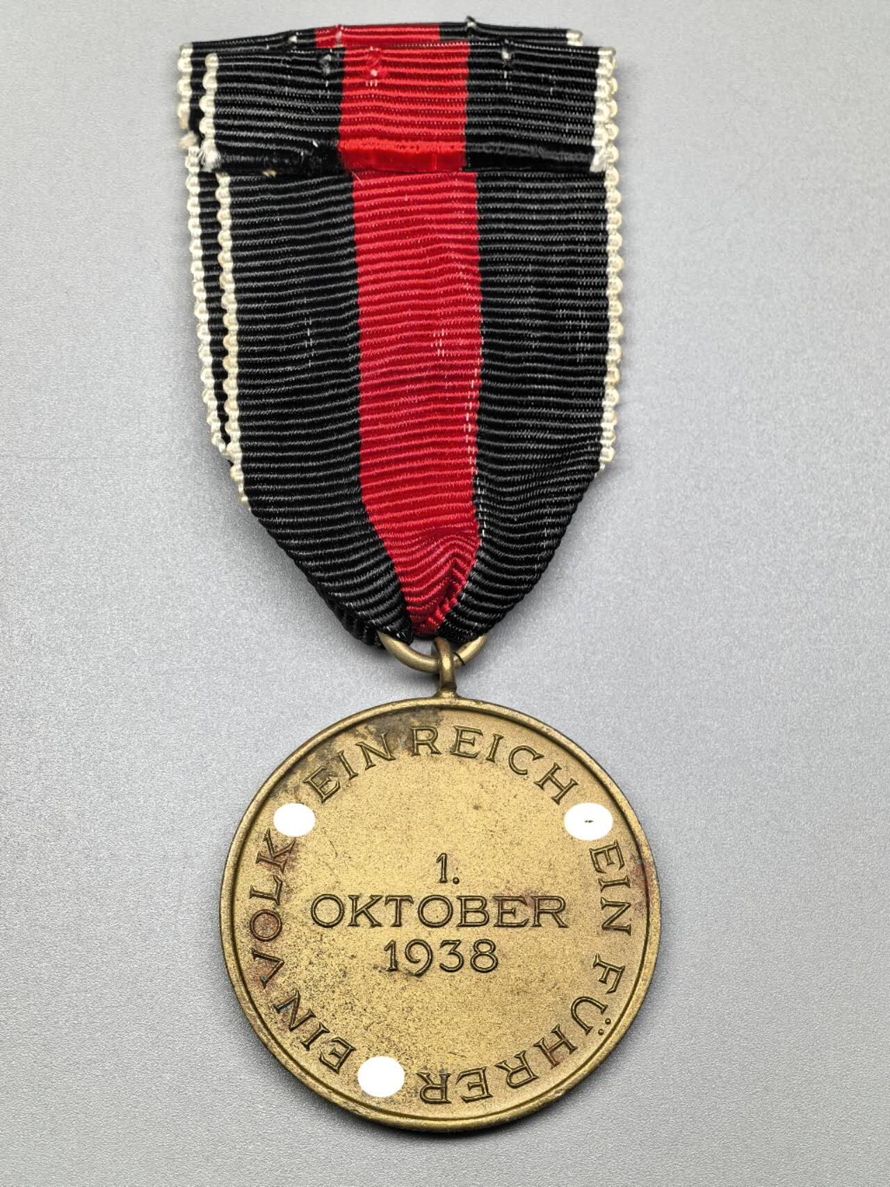 小驴勋章奖章收藏3月7日周六晚六点拍卖（珍爱和平，收藏战争，铭记历史，勿忘国耻，忠党爱国。有偿代拍，送拍规则在简介最后，参拍须阅读规则后再参拍，关系到运费包装发货时效真假辨别等关键信息，拍卖时不再发原图，看大图店主微信码在拍卖店铺介绍里） 得三苏台德回归奖章