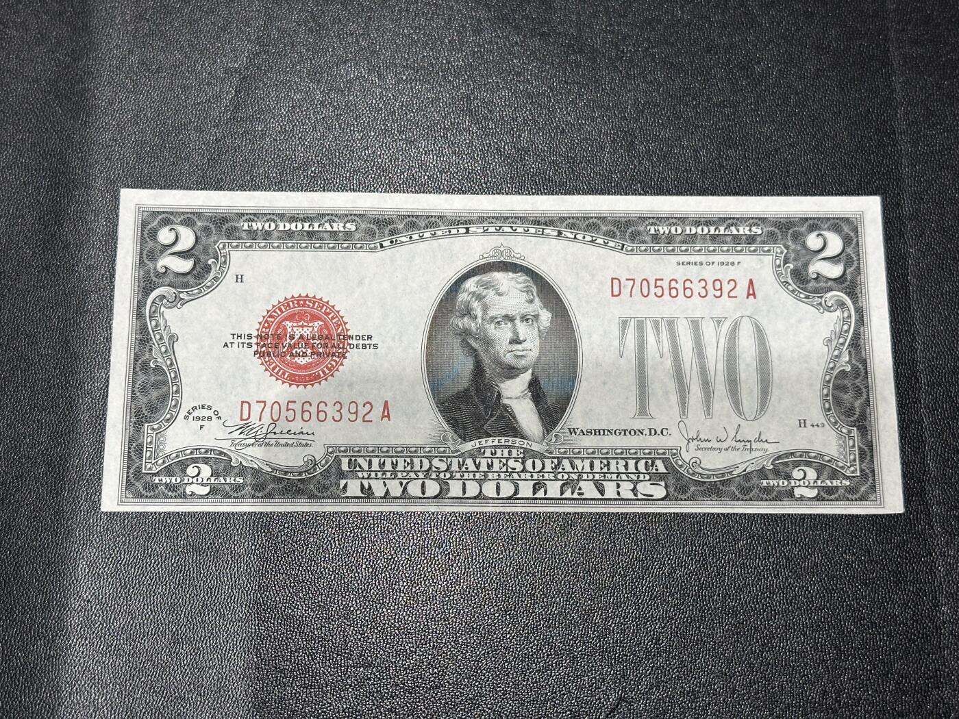 《外钞收藏家》第六百一十五期（畅拍场）（长期征集拍品、欢迎藏友们联系合作） 1928年美国2美元 红库印 UNC-