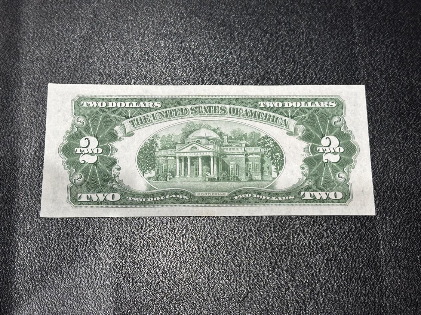 《外钞收藏家》第六百一十五期（畅拍场）（长期征集拍品、欢迎藏友们联系合作） 1928年美国2美元 红库印 UNC-