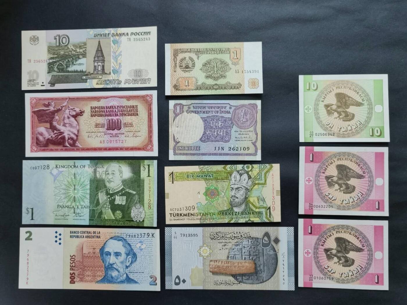 外国纸币专场260307场 不同国家11张，全新品相UNC。