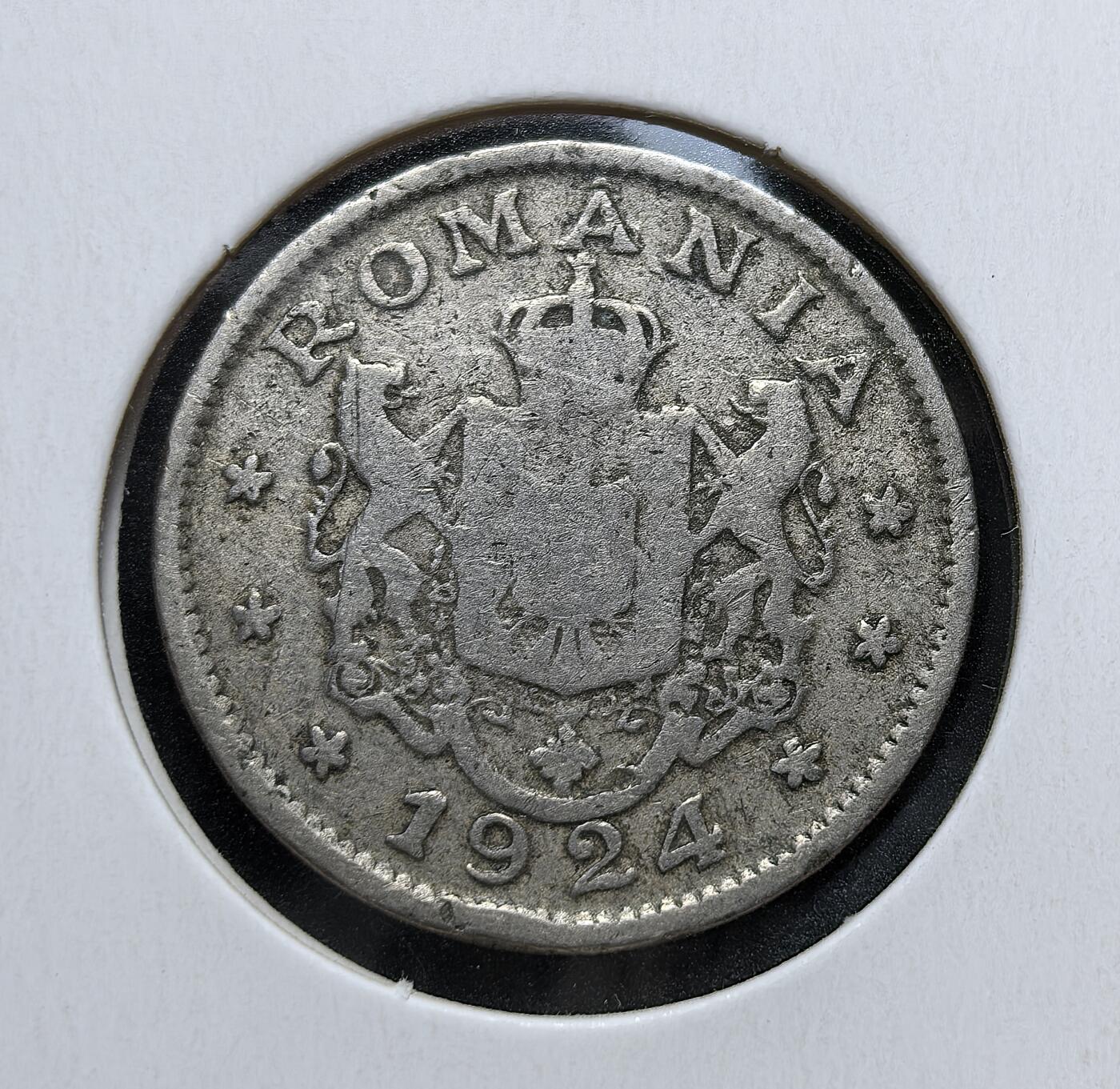 外国优质老铜币银币苏联纪念章，每周六晚九点倒数截拍，满百包邮可寄存，持续收拍 罗马尼亚王国斐迪南一世1924年1列伊闪电版，正面为罗马尼亚国徽与年份，背面刻麦穗纹饰，由比利时布鲁塞尔与法国普瓦西造币厂铸造，是一战后罗马尼亚恢复货币秩序的流通币。
