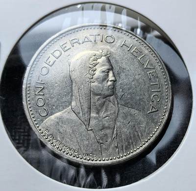 外国优质老铜币银币苏联纪念章，每周六晚九点倒数截拍，满百包邮可寄存，持续收拍 - 瑞士1994年版5法郎，正面刻拉丁国名 “CONFOEDERATIO HELVETICA” 与民族英雄威廉・泰尔像，象征反抗压迫的自由精神；背面为瑞士国徽与雪绒花等国花，由伯尔尼造币厂铸造，是瑞士联邦精神的具象载体。