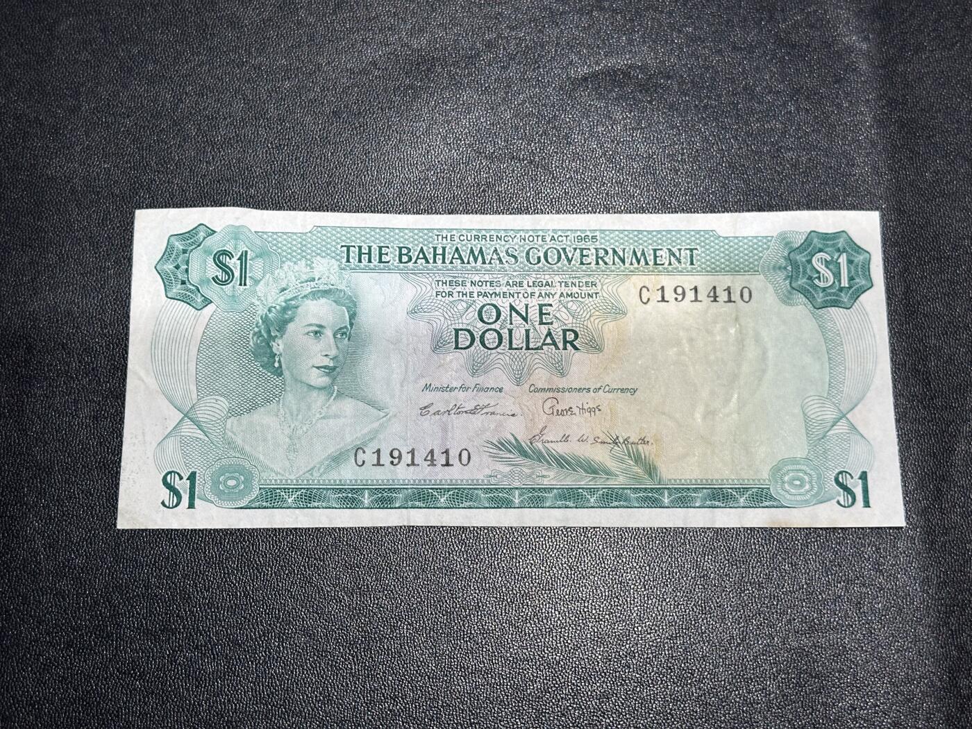 《外钞收藏家》第六百一十五期（畅拍场）（长期征集拍品、欢迎藏友们联系合作） 1965年巴哈马1元 彩背 非全新 品相如图