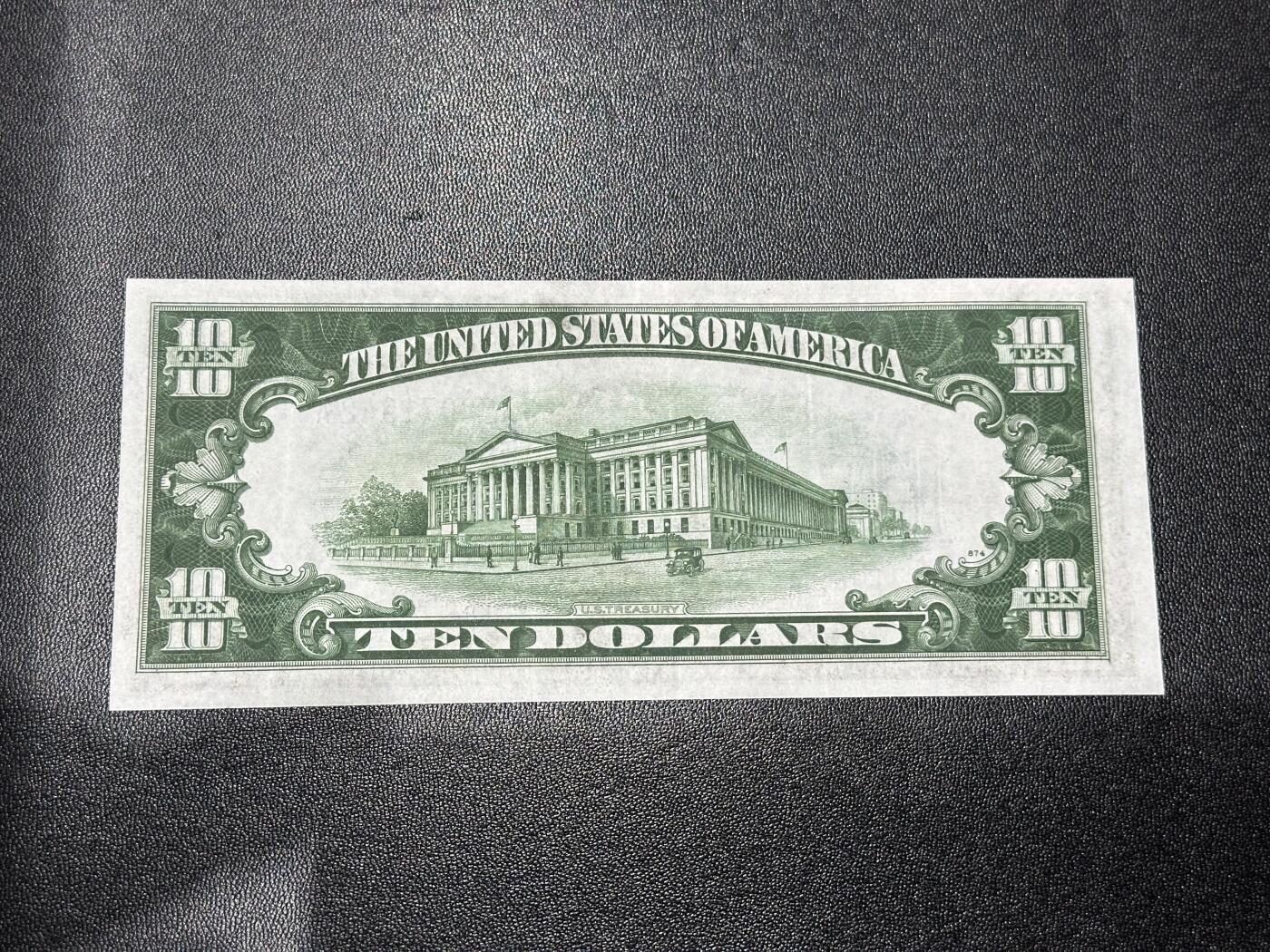 《外钞收藏家》第六百一十五期（畅拍场）（长期征集拍品、欢迎藏友们联系合作） 1934年美国10美元 北非券 非全新 品相如图