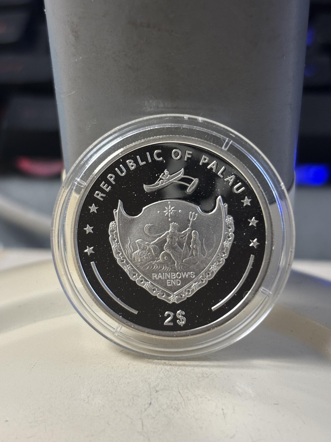 第192期拍卖 帕劳2011年奔驰专利汽车1886镀金银币，925银，10克，发行77枚