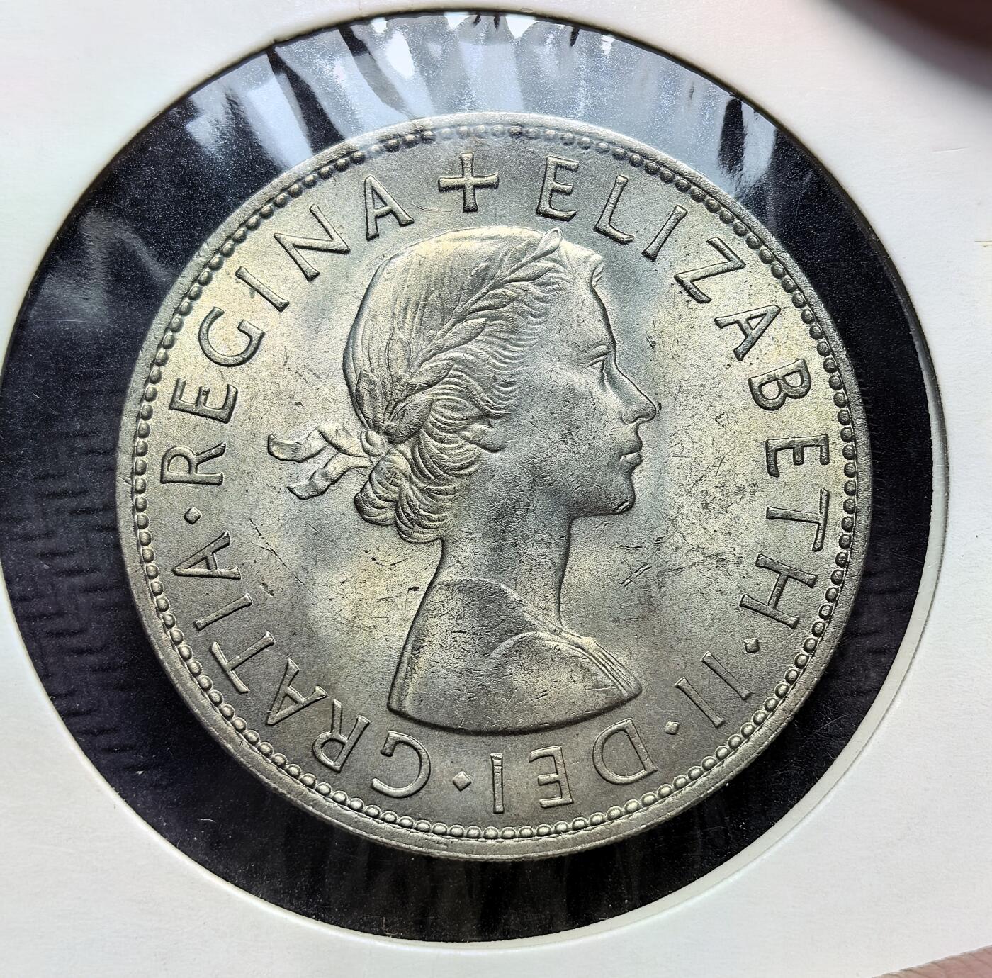 外国优质老铜币银币苏联纪念章，每周六晚九点倒数截拍，满百包邮可寄存，持续收拍 好品带光英国伊丽莎白二世1967年半克朗铜币，属女王第二版币面。彼时英国 十进制改革推进，该币为旧制最后版别之一，次年十进制货币启用后，半克朗逐渐退出流通。