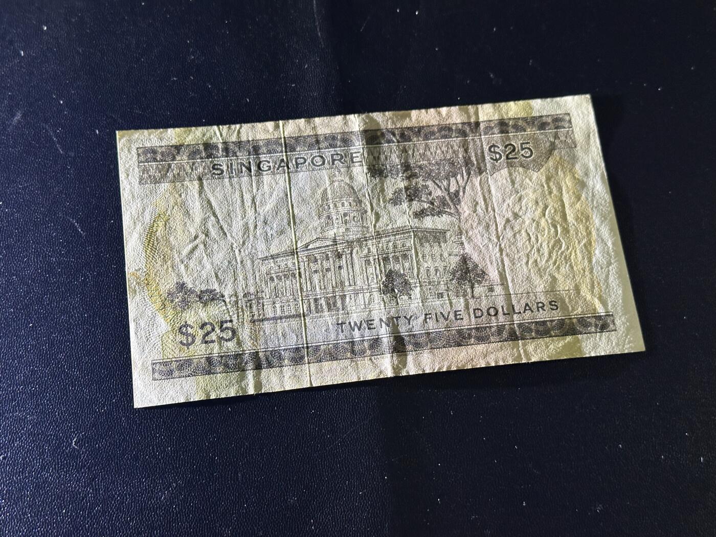 《外钞收藏家》第六百一十五期（畅拍场）（长期征集拍品、欢迎藏友们联系合作） 新加坡花版25元 非全新 品相如图