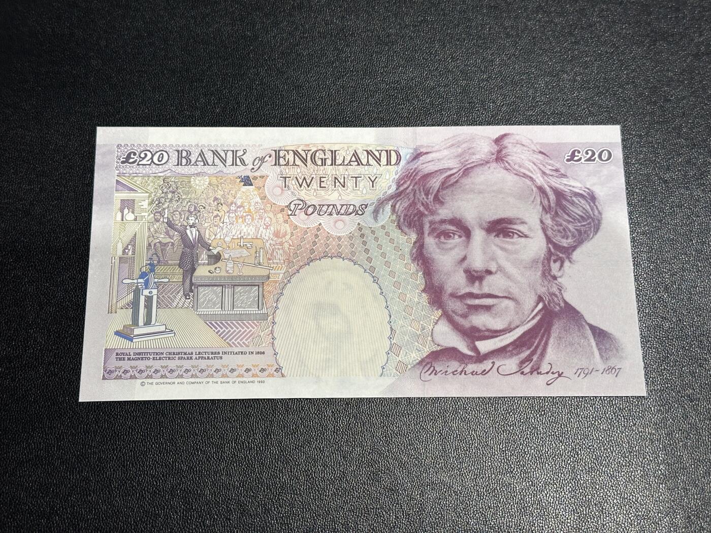 《外钞收藏家》第六百一十五期（畅拍场）（长期征集拍品、欢迎藏友们联系合作） 英国E序列20镑 UNC- 有潮斑