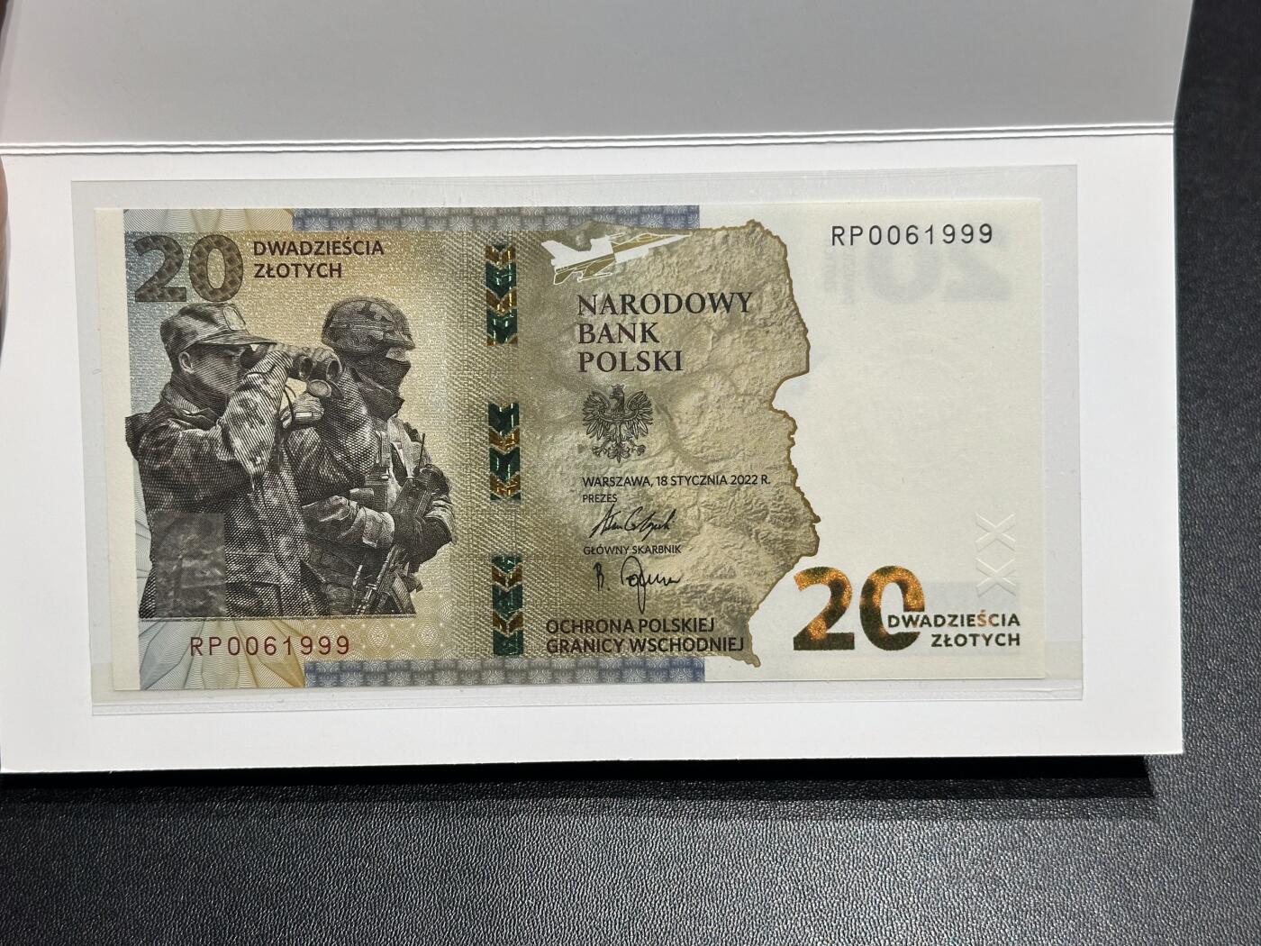 《外钞收藏家》第六百一十五期（畅拍场）（长期征集拍品、欢迎藏友们联系合作） 2022年波兰纪念钞 带册子 豹子号999  倒置号 全新UNC