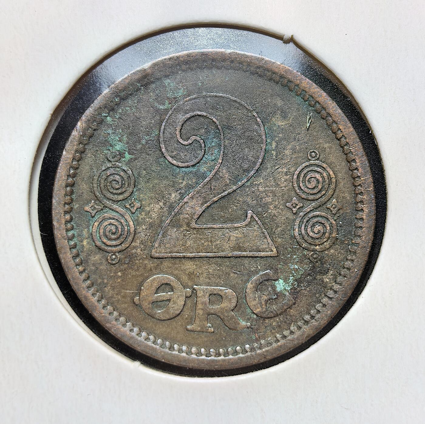 外国优质老铜币银币苏联纪念章，每周六晚九点倒数截拍，满百包邮可寄存，持续收拍 丹麦1915年2欧尔青铜币，正面为国王克里斯蒂安十世（Christian X）的花押 “CX” 与皇冠，背面是面值 “2 ØRE”。一战期间丹麦保持中立，货币体系稳定，此币为当时流通辅币，见证了丹麦君主制与北欧货币史。