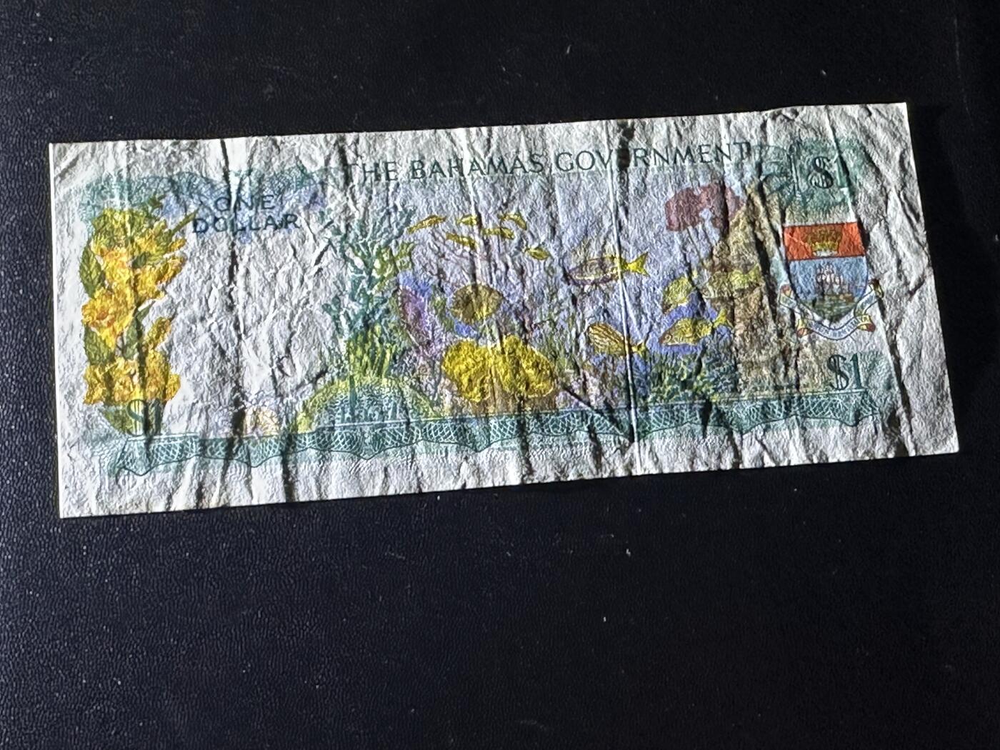 《外钞收藏家》第六百一十五期（畅拍场）（长期征集拍品、欢迎藏友们联系合作） 1965年巴哈马1元 彩背 非全新 品相如图