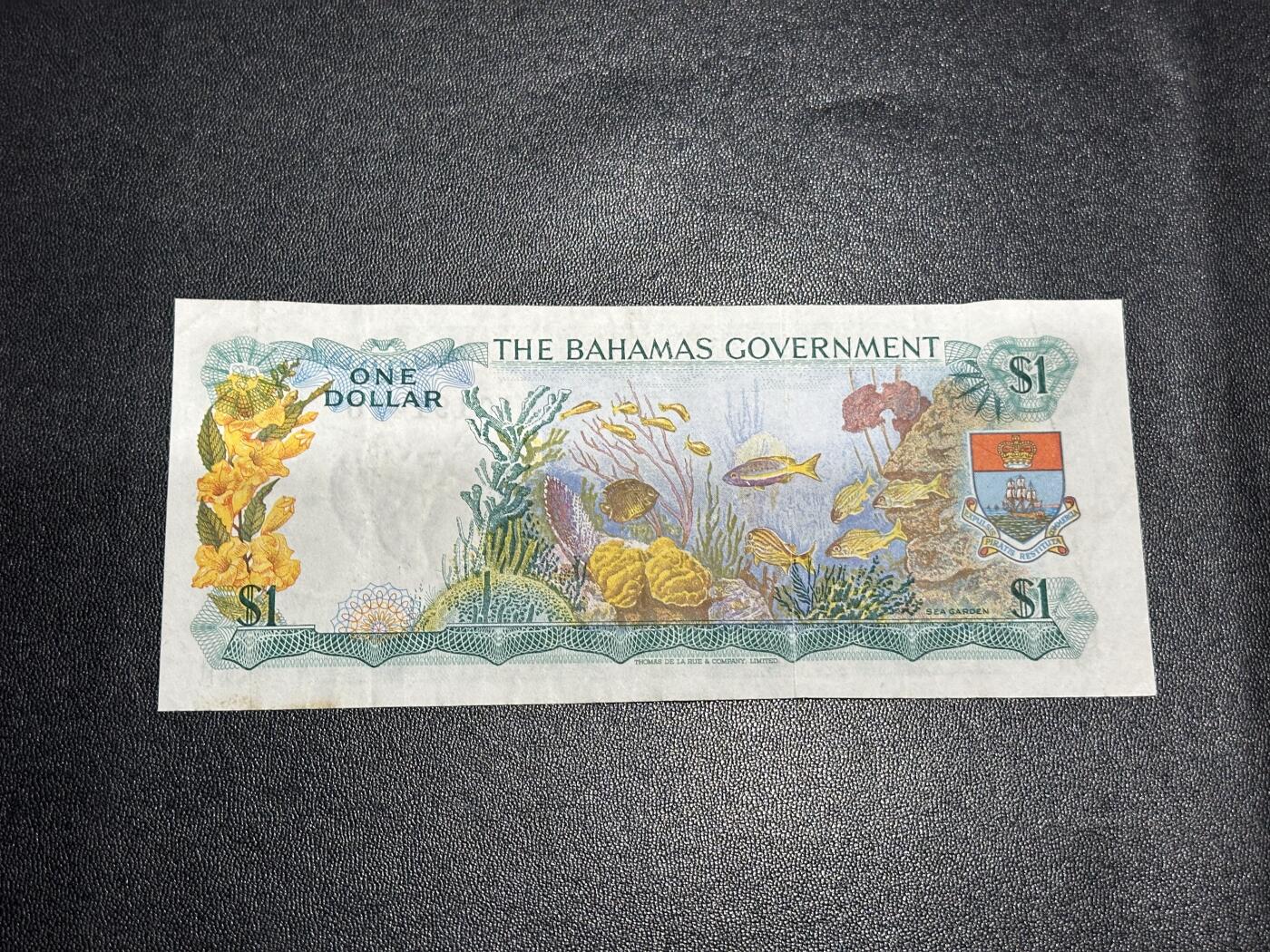 《外钞收藏家》第六百一十五期（畅拍场）（长期征集拍品、欢迎藏友们联系合作） 1965年巴哈马1元 彩背 非全新 品相如图