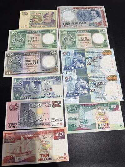 《外钞收藏家》第六百一十五期（畅拍场）（长期征集拍品、欢迎藏友们联系合作） - 新加坡、港币、荷兰、瑞典 11张一起 有新有旧