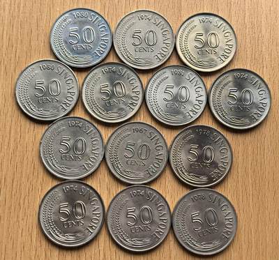 外国优质老铜币银币苏联纪念章，每周六晚九点倒数截拍，满百包邮可寄存，持续收拍 - 新加坡 1967–1981 年首版 50 分流通币13枚，由 Stuart Devlin 设计，背面狮子鱼图案象征海洋生态，正面为稻穗与年份，材质为铜镍合金，是新加坡独立后首批自主货币之一。