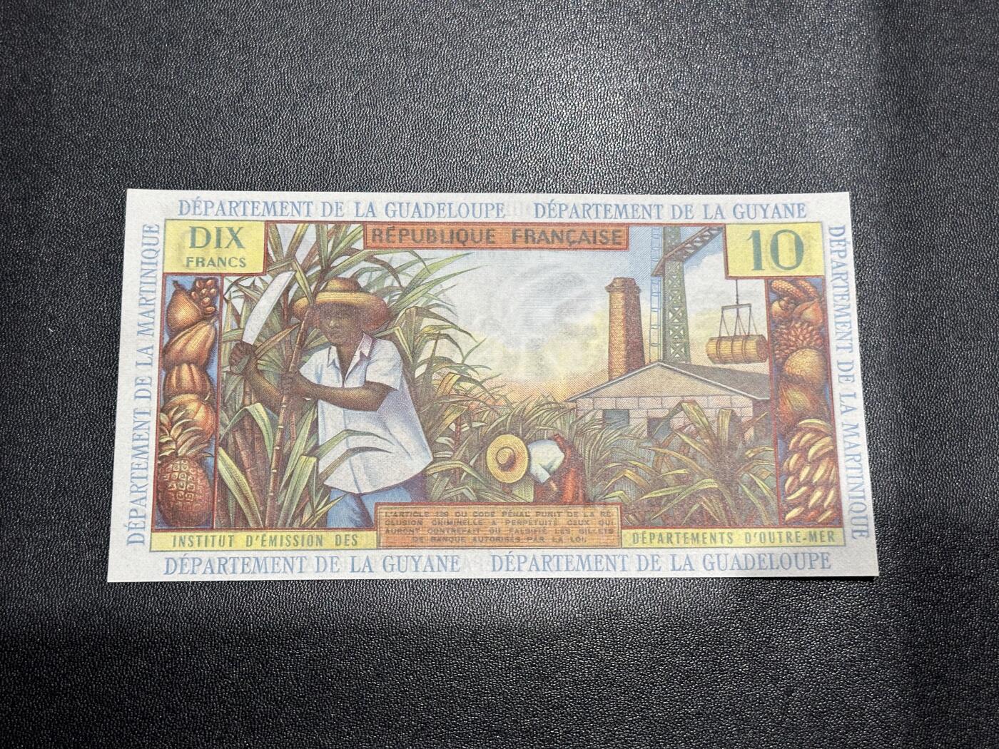 《外钞收藏家》第六百一十五期（畅拍场）（长期征集拍品、欢迎藏友们联系合作） 1964年法属安提列斯10法郎 全新