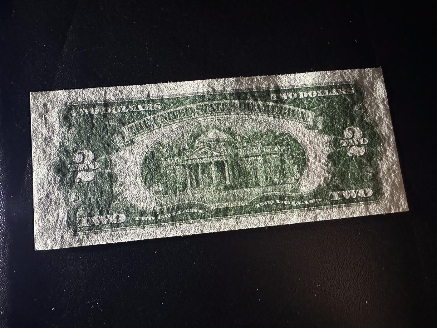 《外钞收藏家》第六百一十五期（畅拍场）（长期征集拍品、欢迎藏友们联系合作） 1928年美国2美元 红库印 UNC-