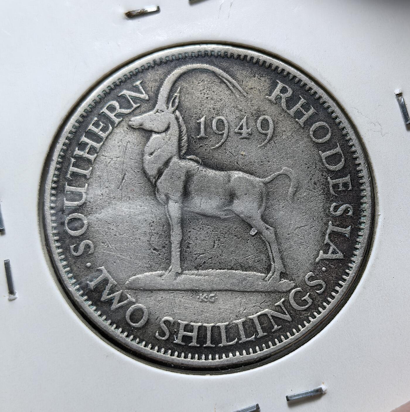 外国优质老铜币银币苏联纪念章，每周六晚九点倒数截拍，满百包邮可寄存，持续收拍 南罗得西亚1949 年黑纹羚羊2先令，属英国殖民时期货币：正面为英王乔治六世头像，背面刻有代表当地的黑纹羚羊，采用英制先令体系，1953 年随罗得西亚和尼亚萨兰联邦成立而逐步退出流通。