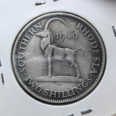 外国优质老铜币银币苏联纪念章，每周六晚九点倒数截拍，满百包邮可寄存，持续收拍 - 南罗得西亚1949 年黑纹羚羊2先令，属英国殖民时期货币：正面为英王乔治六世头像，背面刻有代表当地的黑纹羚羊，采用英制先令体系，1953 年随罗得西亚和尼亚萨兰联邦成立而逐步退出流通。