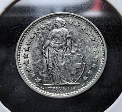 外国优质老铜币银币苏联纪念章，每周六晚九点倒数截拍，满百包邮可寄存，持续收拍 - 瑞士1971年版 ½ 法郎硬币，正面为象征瑞士的赫尔维蒂亚女神形象，周围星代表各州。因白银流失危机，延续联邦货币传统，是瑞士中立与统一的符号载体。